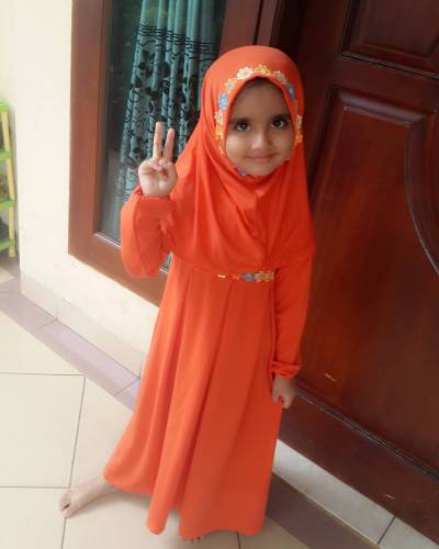 testimonial baju yuli gamis oranye
